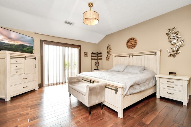 bedroom with access to exterior, vaulted ceiling, and dark hardwood / wood-style floors