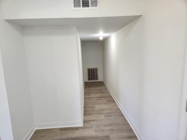 1202 3rd Ave N, Texas City, TX 77590 - hallway with visible vents, baseboards, and light wood-style floors