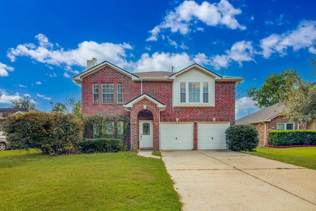 view of front of house featuring a front lawn and a garage