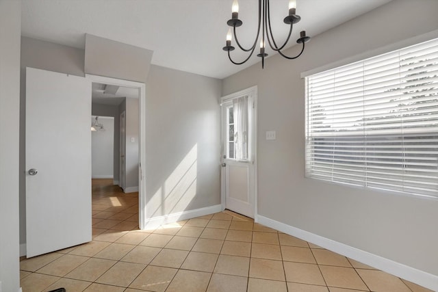 interior space featuring a chandelier