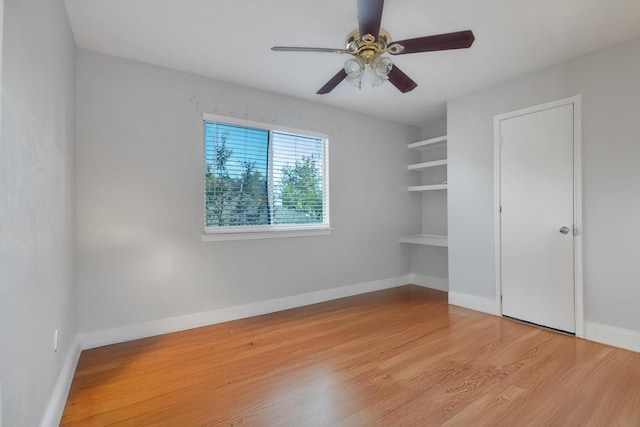 unfurnished bedroom with light hardwood / wood-style flooring and ceiling fan