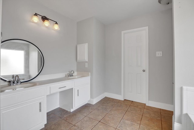 bathroom featuring tile patterned floors and vanity