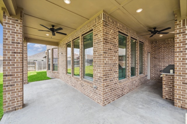 view of patio with ceiling fan