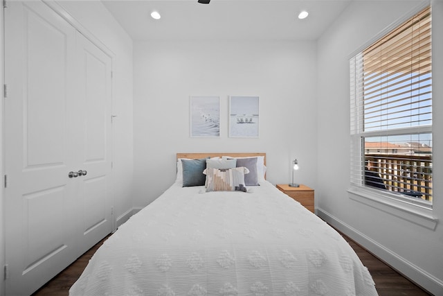 22831 Cuadro St, Galveston, TX 77554 - bedroom featuring dark wood-style flooring, baseboards, and recessed lighting