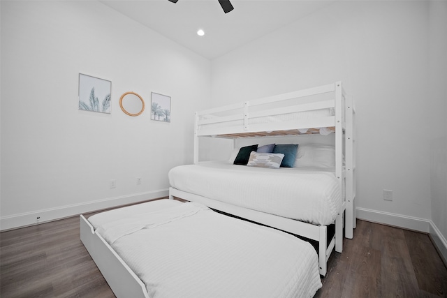 bedroom with wood-type flooring and ceiling fan