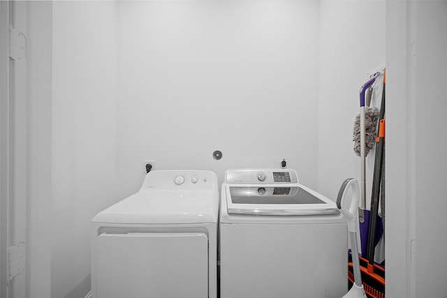 22831 Cuadro St, Galveston, TX 77554 - laundry area featuring independent washer and dryer