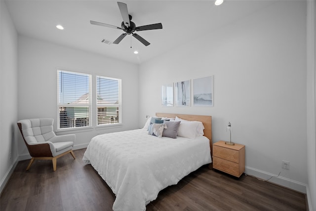 bedroom featuring dark hardwood / wood-style floors and ceiling fan