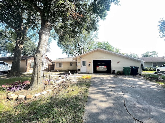 single story home with a garage