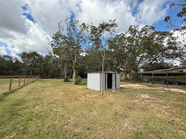 view of yard with a shed