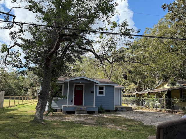 bungalow with a front yard