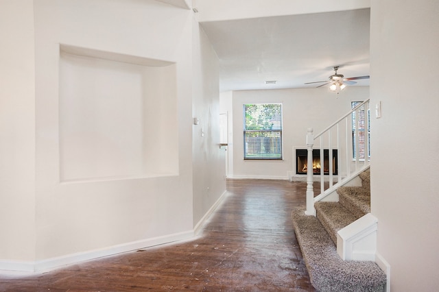 hall with dark wood-type flooring