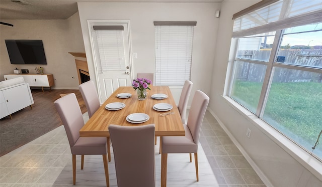 dining area featuring plenty of natural light