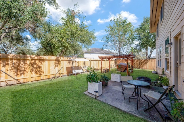4609 Buescher Ct, Pearland, TX 77584 - view of yard featuring a patio and a fenced backyard