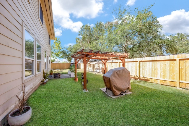 view of yard with a patio area and a pergola