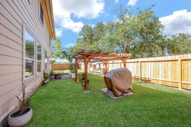 4609 Buescher Ct, Pearland, TX 77584 - view of yard with a fenced backyard, a patio area, and a pergola