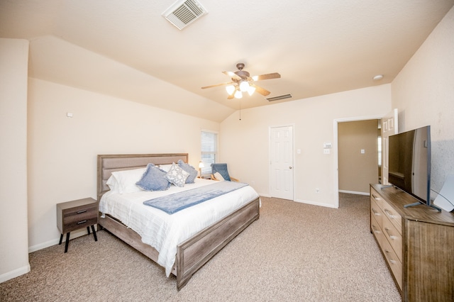 carpeted bedroom featuring lofted ceiling and ceiling fan