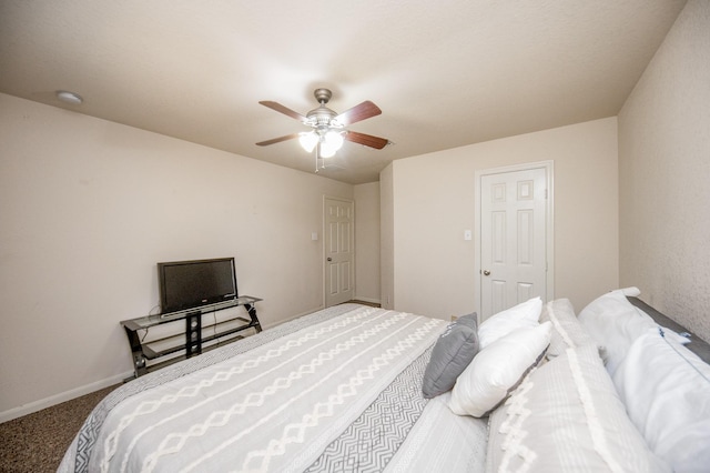 4609 Buescher Ct, Pearland, TX 77584 - carpeted bedroom with ceiling fan and baseboards