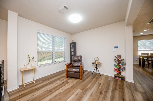 4609 Buescher Ct, Pearland, TX 77584 - sitting room with recessed lighting, visible vents, wood finished floors, and baseboards