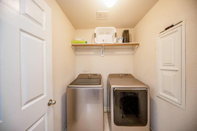 4609 Buescher Ct, Pearland, TX 77584 - washroom with independent washer and dryer, visible vents, and laundry area