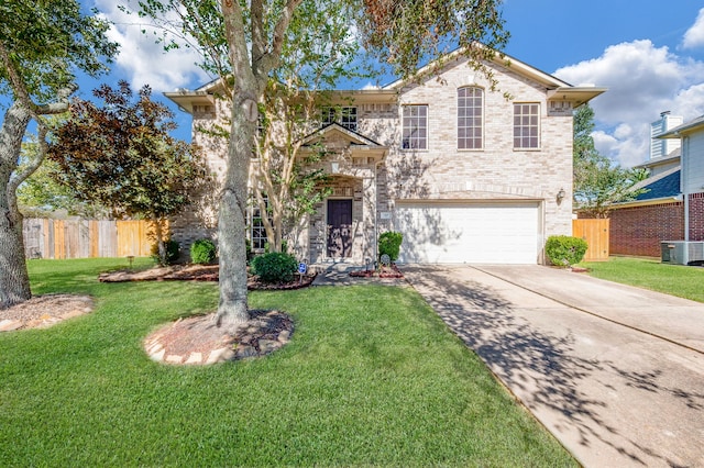 view of front of house featuring central AC, a front yard, and a garage