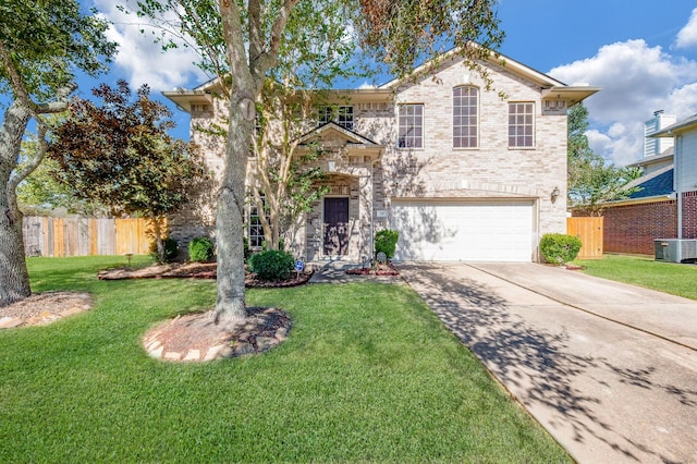 4609 Buescher Ct, Pearland, TX 77584 - traditional home with a front yard, driveway, central AC, and fence