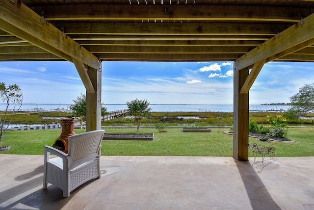 view of patio / terrace featuring a water view