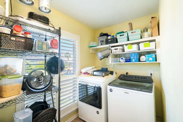 laundry room featuring washing machine and clothes dryer