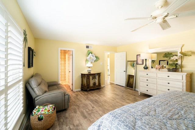 bedroom featuring hardwood / wood-style floors and ceiling fan