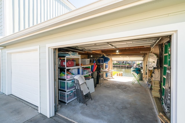 garage featuring a water view