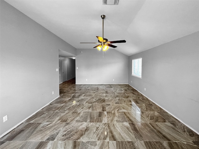 interior space with lofted ceiling and ceiling fan