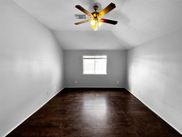 spare room featuring lofted ceiling, ceiling fan, and dark hardwood / wood-style flooring