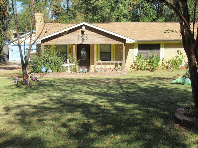 view of front of home featuring a porch and a front yard