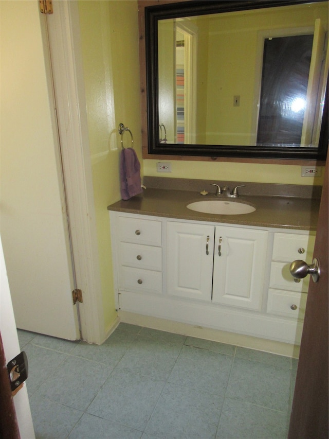 bathroom with vanity and tile patterned floors