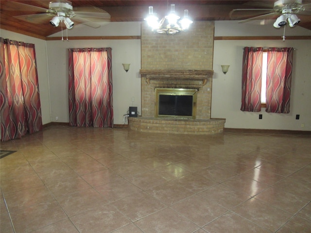 unfurnished living room featuring tile patterned floors, a fireplace, and ceiling fan