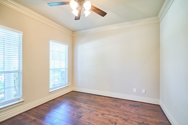 unfurnished room with plenty of natural light, crown molding, dark hardwood / wood-style floors, and ceiling fan