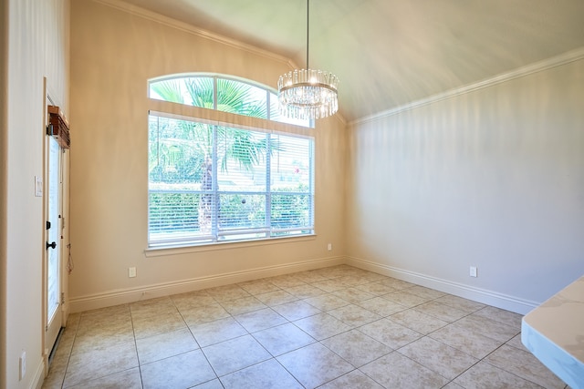 tiled spare room featuring ornamental molding and a notable chandelier