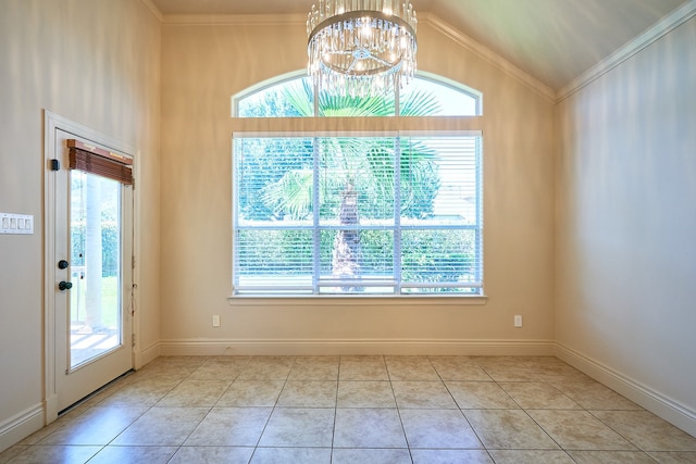 unfurnished dining area with a notable chandelier, light tile patterned flooring, plenty of natural light, and crown molding