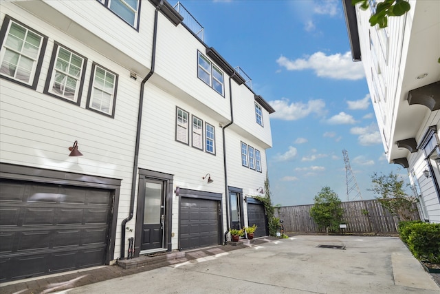 view of property exterior featuring a garage