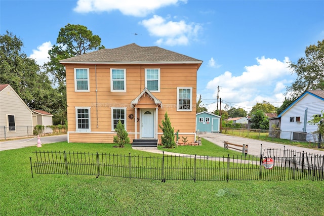 view of front of home with a front yard