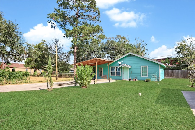 view of front of house with a front lawn