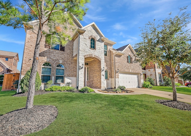 view of front facade featuring a front yard and a garage