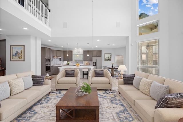 living room with a high ceiling