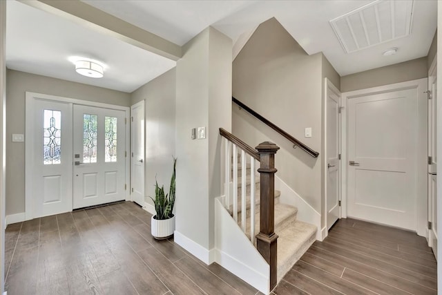 foyer featuring dark wood-type flooring