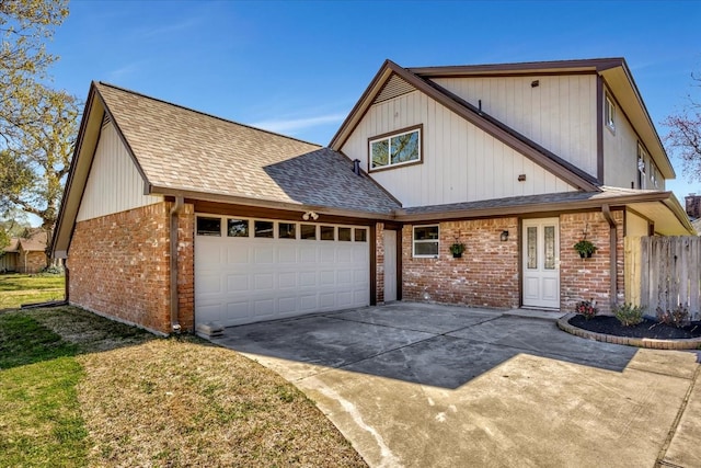 view of front facade featuring a front yard and a garage