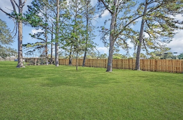 view of yard with fence