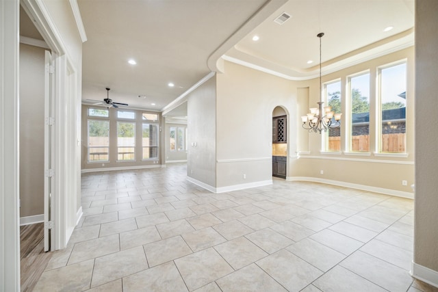 interior space with ornamental molding, light tile patterned floors, and plenty of natural light