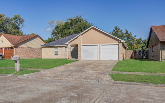 ranch-style house featuring a front lawn and a garage