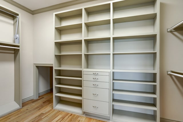 walk in closet featuring light wood-type flooring