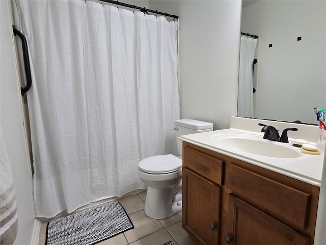 bathroom featuring vanity, toilet, tile patterned floors, and a shower with shower curtain