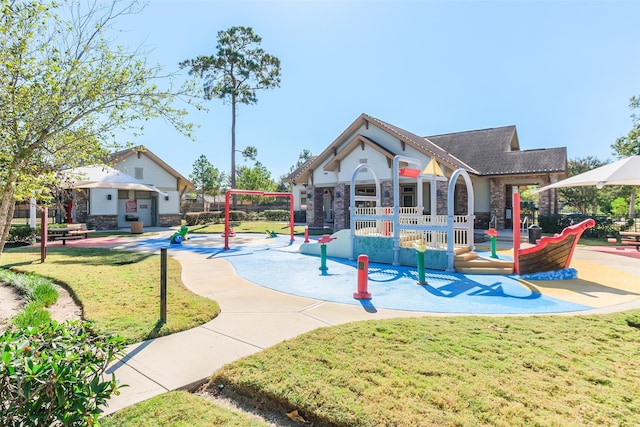 view of playground featuring a patio and a lawn